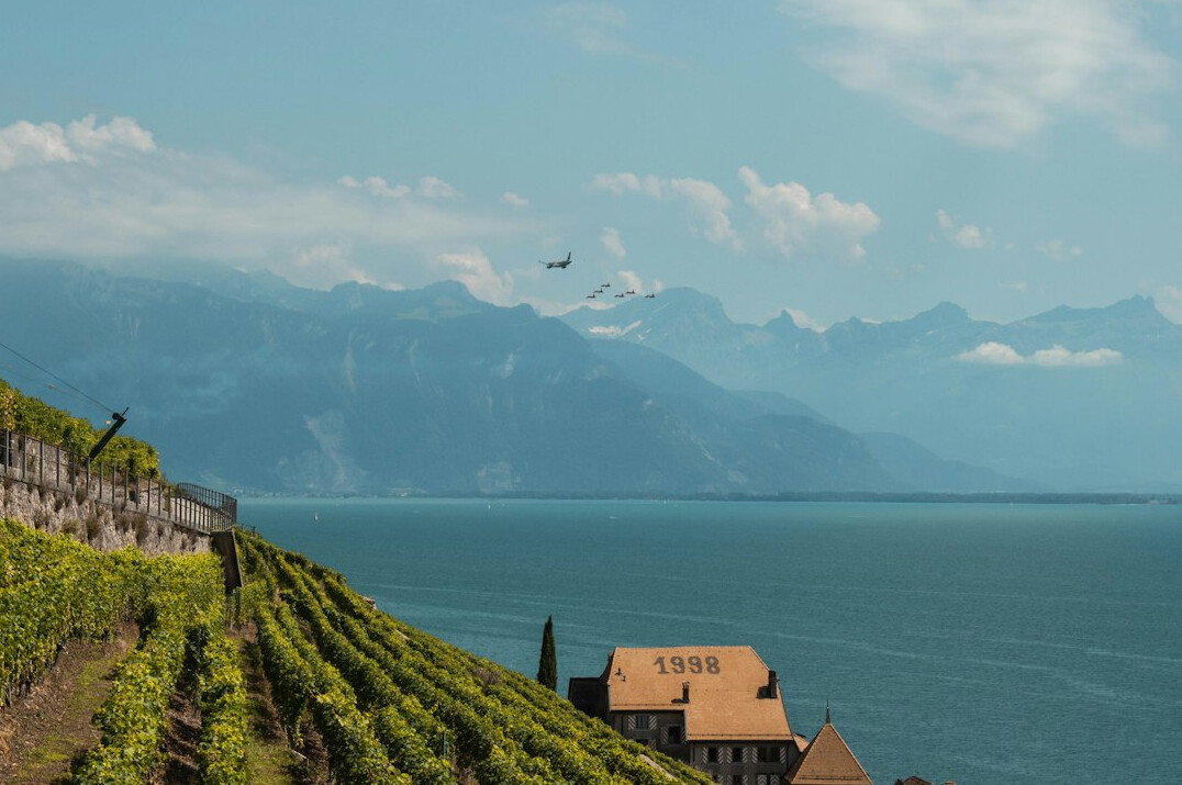 Lake Geneva waterfront with Lausanne and the Alps in the distance
