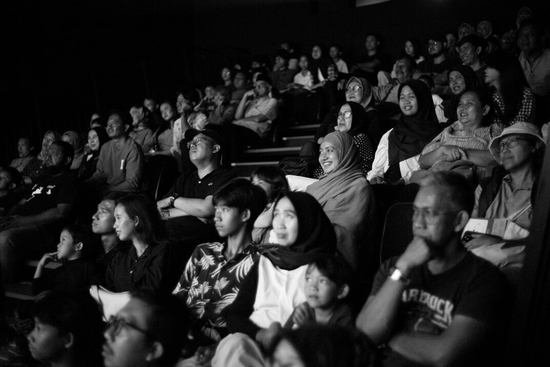 audience watching documentary