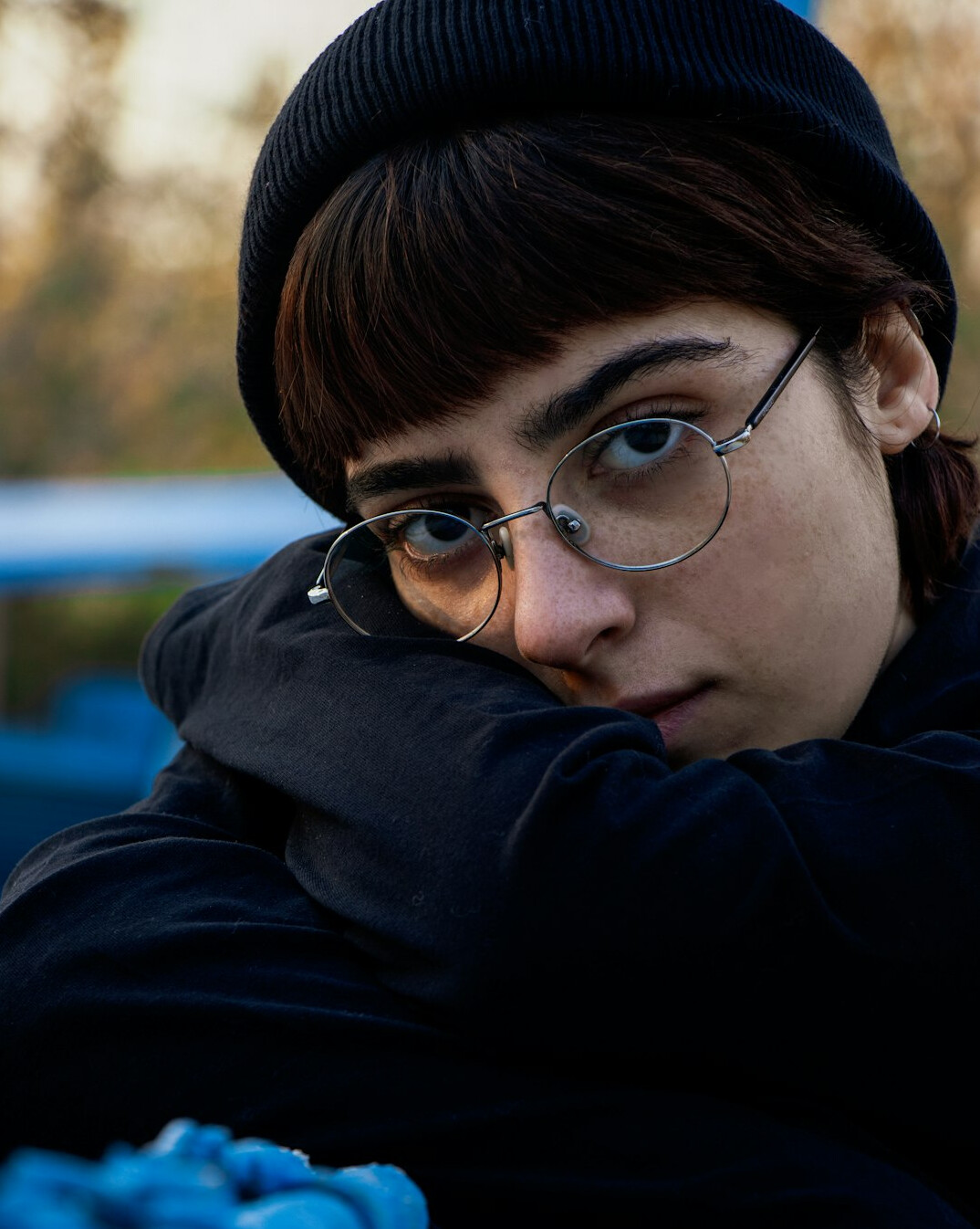 Portrait of a beginner creator woman with glasses
