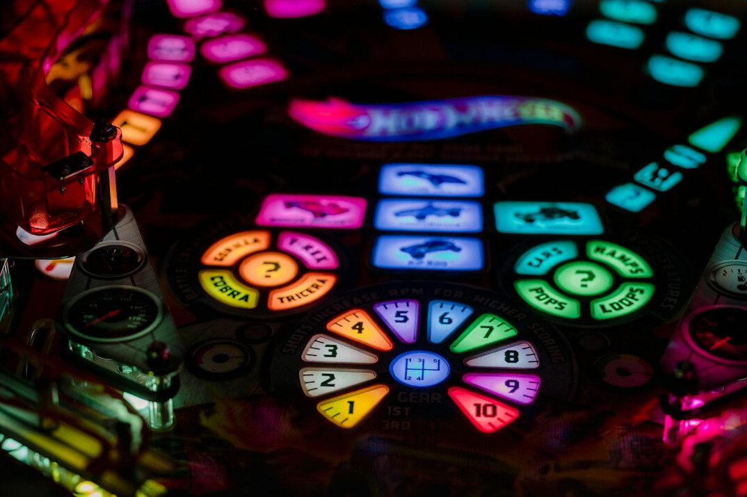 Colour grading panel with colour wheels on a monitor